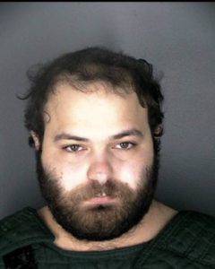 Ahmad Al Aliwi Alissa, the Boulder shooter, in a booking photo released by Boulder PD.