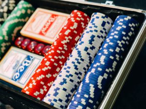 Representative photo of poker chips and cards in a box | Photo by Chris Liverani on Unsplash