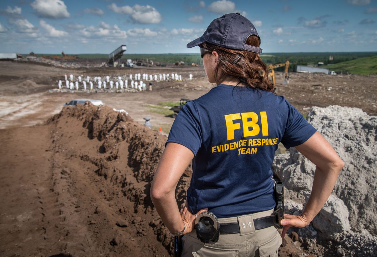 FBI Jacksonville Special Agent Lauren Regucci conducts a landfill search for evidence related to a homicide in July 2018 in Folkston, Georgia. After years as a high school counselor, Regucci joined the FBI in 2002 in search of a new challenge. Today, she leads the Jacksonville Evidence Response Team and is an agent on the counterterrorism squad on the Joint Terrorism Task Force.