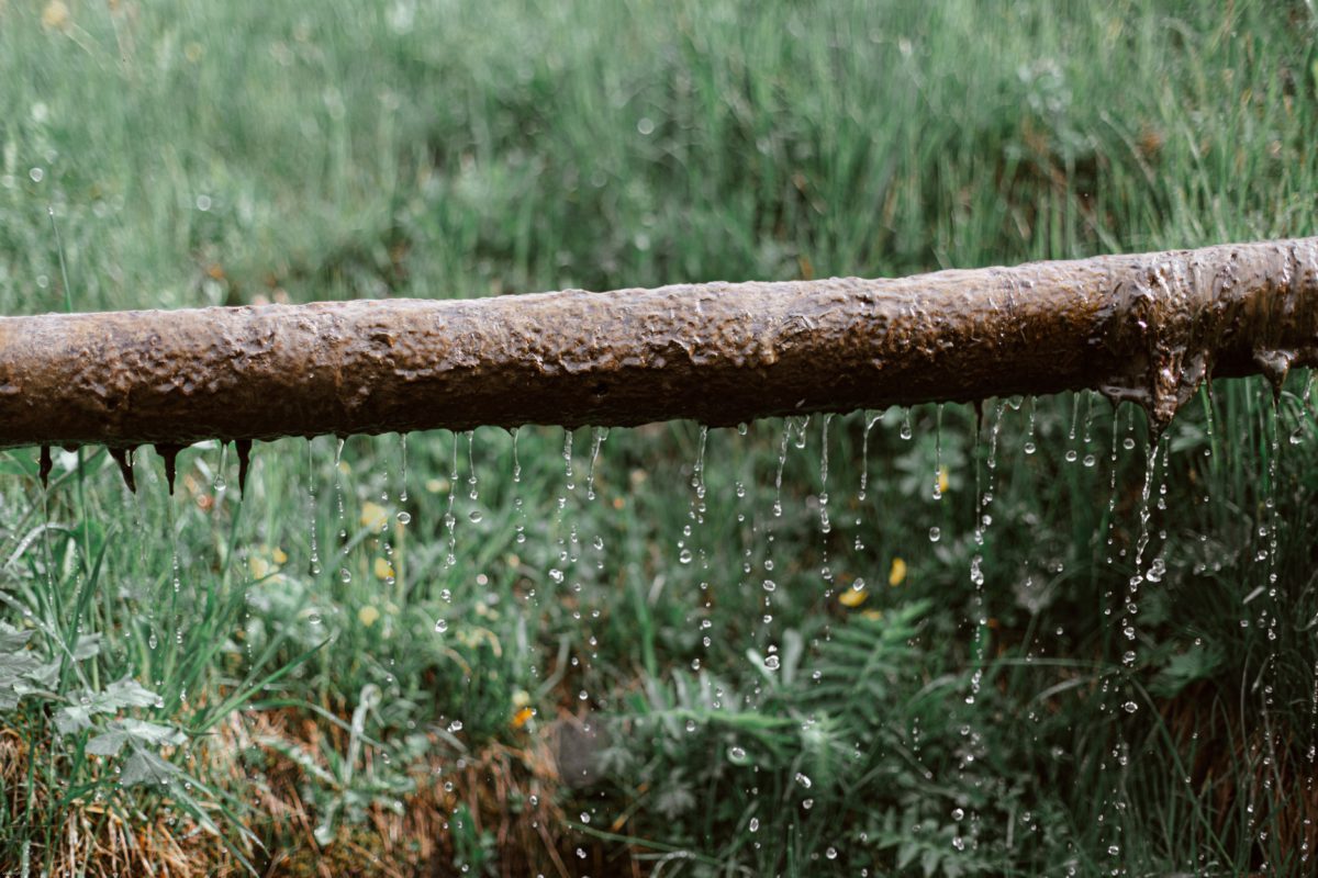 Photo of a rusted metal pipe outdoors